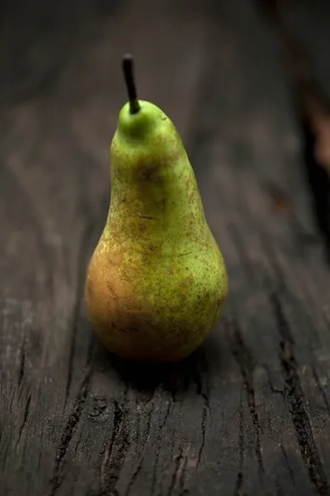 Framed Print : Close up of pear on table