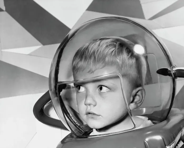 Framed Print : Close-up of a boy wearing a space helmet