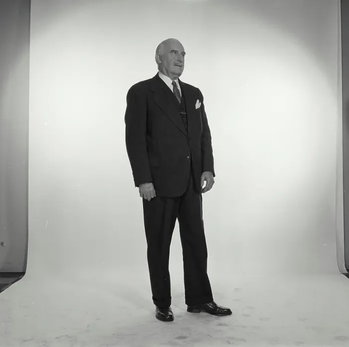 Framed Print : Close-up of a businessman standing