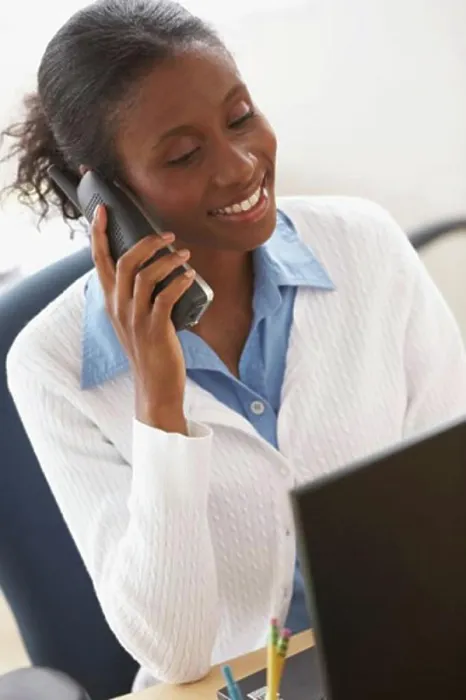 Framed Print : Close-up of a businesswoman talking on the phone