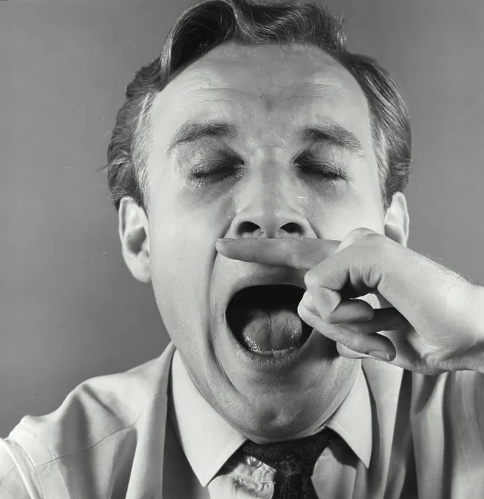 Framed Print : Close-up of a mature man sneezing