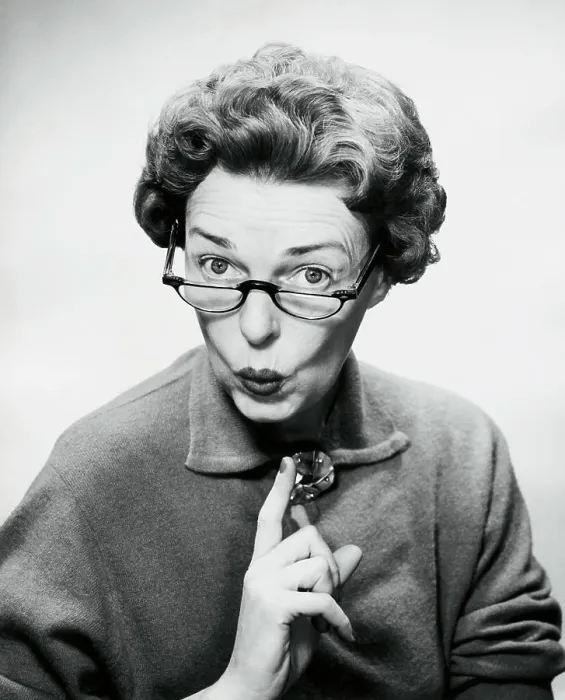 Framed Print : Close-up of a mid adult woman puckering her lips Framed Print : Close-up of a mid adult woman puckering her lips