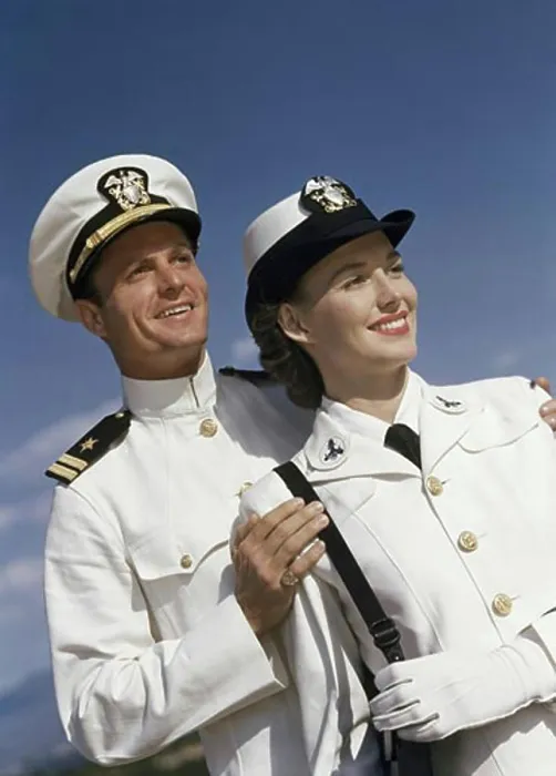 Framed Print : Close-up of a young couple smiling in US Naval uniforms Framed Print : Close-up of a young couple smiling in US Naval uniforms