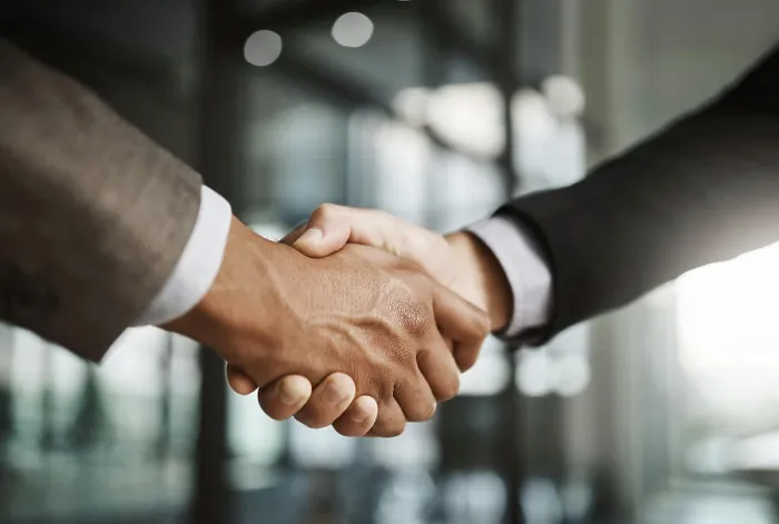 Framed Print : Closeup of business men giving handshake Framed Print : Closeup of business men giving handshake