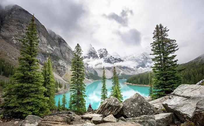 Framed Print : Cloudy mountain peaks, turquoise glacial lake Framed Print : Cloudy mountain peaks, turquoise glacial lake