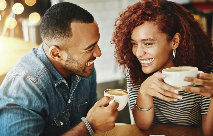 Framed Print : Coffee, conversation and couple laughing on date in cafe for morning catch up together with bonding Framed Print : Coffee, conversation and couple laughing on date in cafe for morning catch up together with bonding
