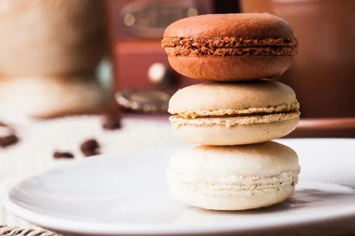 Framed Print : Three colors of macaroons in brown and beige tones Framed Print : Three colors of macaroons in brown and beige tones