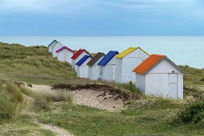 Framed Print : Colourful beach houses in the dunes on the beach of Gouville-sur-Mer, Normandy, France, Europe