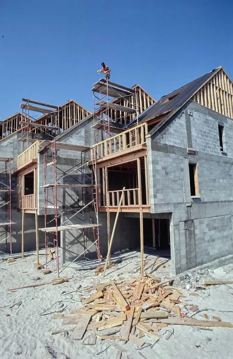 Framed Print : Construction progress on new residential homes under clear blue skies Framed Print : Construction progress on new residential homes under clear blue skies