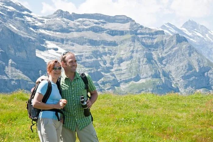 Framed Print : Couple Looking at View, Bernese Oberland, Switzerland Framed Print : Couple Looking at View, Bernese Oberland, Switzerland