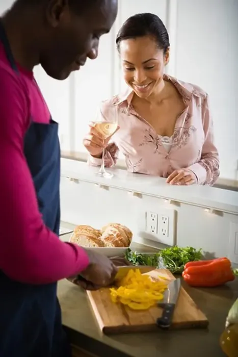 Framed Print : A couple preparing food