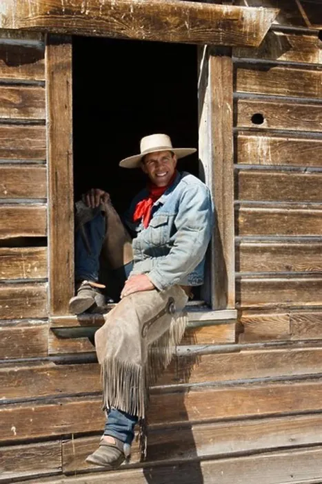 Framed Print : cowboy sitting in barn window, wildwest, Oregon, USA Framed Print : cowboy sitting in barn window, wildwest, Oregon, USA