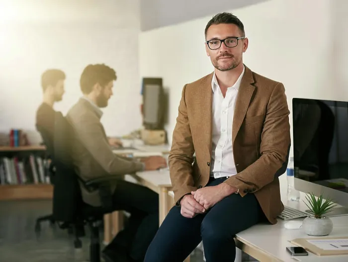 Framed Print : Creative, man and portrait or relax on table in office for work or career in project management by agency