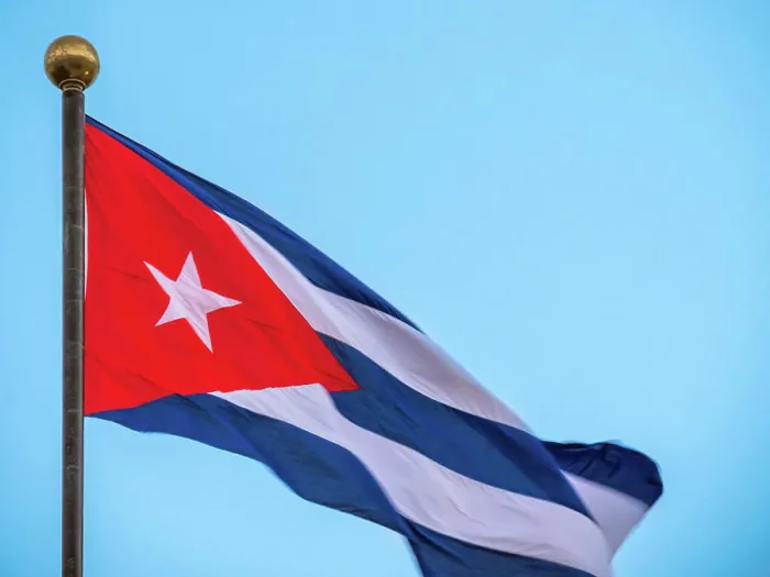 Framed Print : CUBA flag waving with a cloudy blue sky