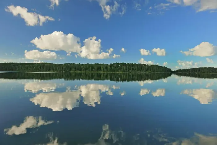 Framed Print : Cumulus clouds reflected in Lac Seul Ear Falls Ontario Canada Framed Print : Cumulus clouds reflected in Lac Seul Ear Falls Ontario Canada