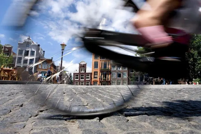 Framed Print : Cyclist, Amsterdam, the Netherlands Framed Print : Cyclist, Amsterdam, the Netherlands