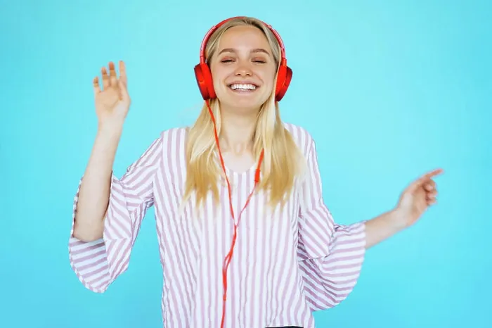 Framed Print : Dancing girl listens to music in earphones Dancing girl listens to music in earphones Framed Print : Dancing girl listens to music in earphones Dancing girl listens to music in earphones