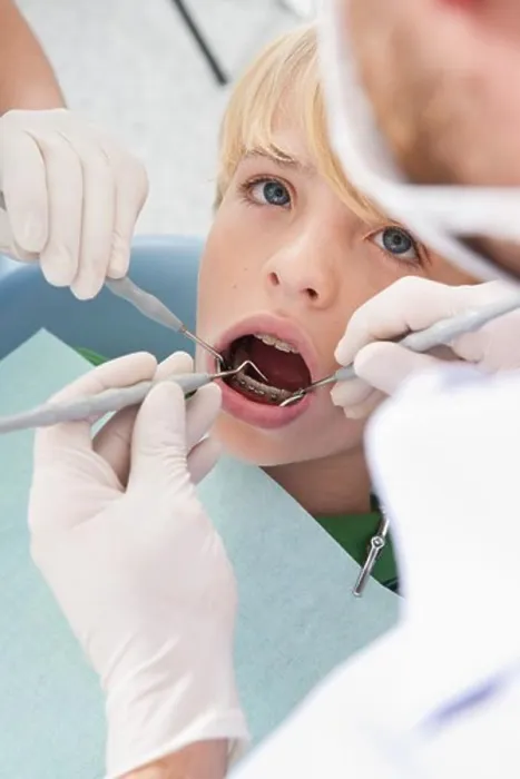 Framed Print : Dentist and Hygienist checking Boy's Teeth during Appointment, Germany Framed Print : Dentist and Hygienist checking Boy's Teeth during Appointment, Germany
