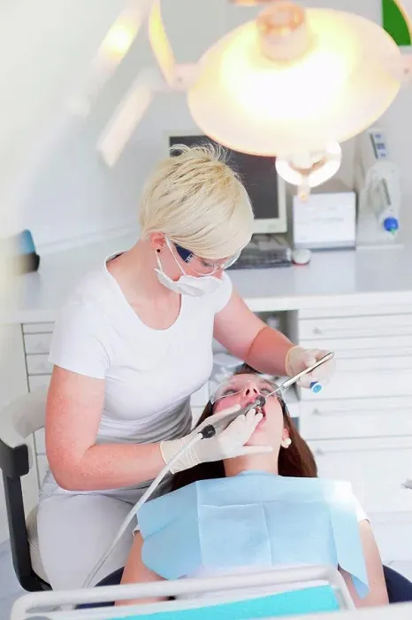 Framed Print : Dentist working on patients teeth Framed Print : Dentist working on patients teeth
