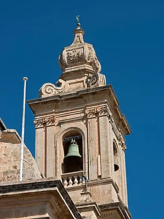 Framed Print : Detailed view of a baroque bell tower with decoration and blue sky in the background Framed Print : Detailed view of a baroque bell tower with decoration and blue sky in the background