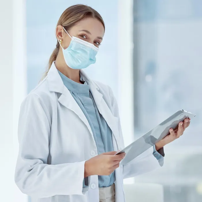 Framed Print : Doctor with covid face mask and a checklist for compliance Framed Print : Doctor with covid face mask and a checklist for compliance