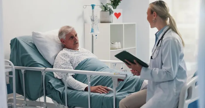 Framed Print : Doctor with tablet, consulting and old man in hospital bed for healthcare