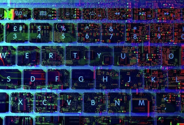 Framed Print : Double exposure of the inside and out of a laptop computer showing the electronic components under the keyboard Framed Print : Double exposure of the inside and out of a laptop computer showing the electronic components under the keyboard