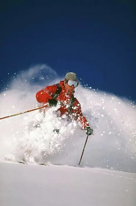 Framed Print : Downhill skier skiing on mountain Framed Print : Downhill skier skiing on mountain