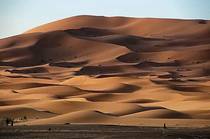 Framed Print : Dramatic dune shapes characterised by shadow and light Framed Print : Dramatic dune shapes characterised by shadow and light