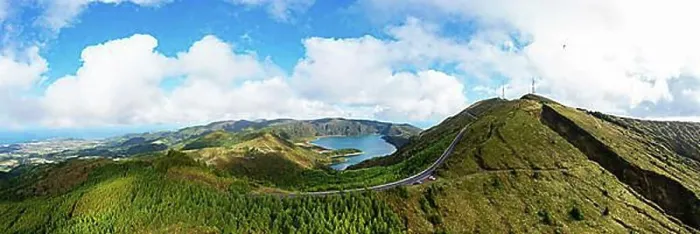 Framed Print : Drone shot, mountain road to the summit of Pico da Barrosa and view to the crater lake Lagoa do Fogo Framed Print : Drone shot, mountain road to the summit of Pico da Barrosa and view to the crater lake Lagoa do Fogo