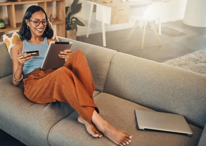 Framed Print : Ecommerce, credit card and woman on a sofa Framed Print : Ecommerce, credit card and woman on a sofa