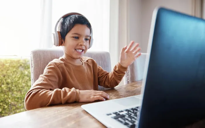 Framed Print : Elearning, wave and kid on laptop video call with headphones for education or studying Framed Print : Elearning, wave and kid on laptop video call with headphones for education or studying