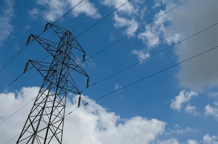 Framed Print : Electricity pylon against sky