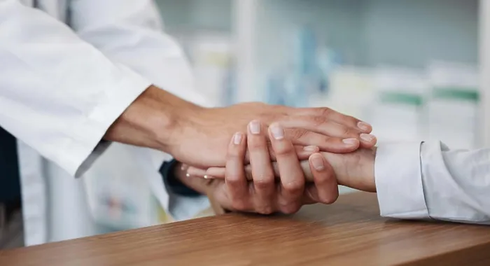 Framed Print : Empathy, support and pharmacy with hand holding with people for consulting