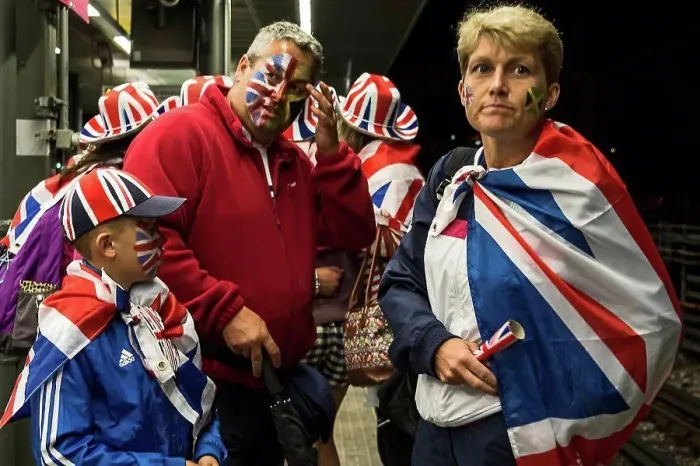 Framed Print : England, London, Stratford. A group of British fans return home after a day at a sporting event Framed Print : England, London, Stratford. A group of British fans return home after a day at a sporting event