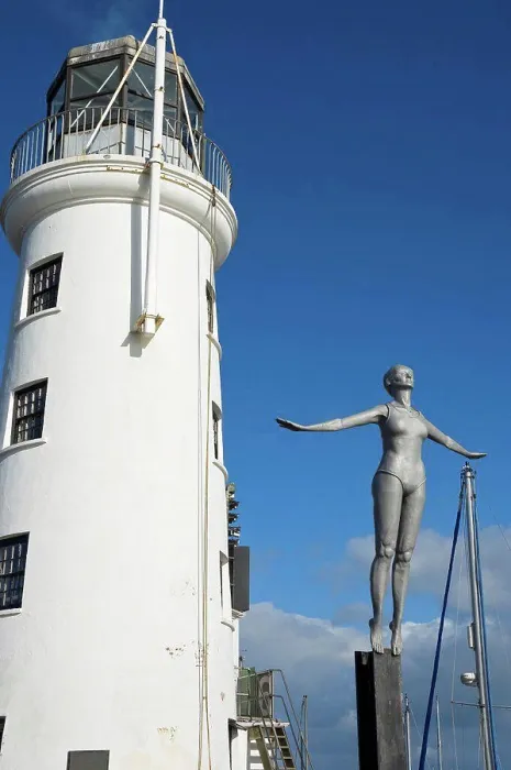 Framed Print : England, North Yorkshire, Scarborough. Figure of the Diving Belle next to Scarborough Lighthouse Framed Print : England, North Yorkshire, Scarborough. Figure of the Diving Belle next to Scarborough Lighthouse