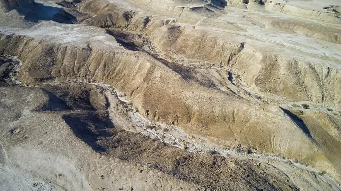 Framed Print : Eroded sandstone mountains on sea shore, Dead Sea, Israel. Aerial photography with drone Framed Print : Eroded sandstone mountains on sea shore, Dead Sea, Israel. Aerial photography with drone