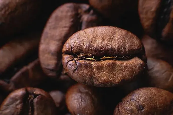 Framed Print : Extreme macro Coffee beans close up for background in shallow depth of field. macro photography Framed Print : Extreme macro Coffee beans close up for background in shallow depth of field. macro photography