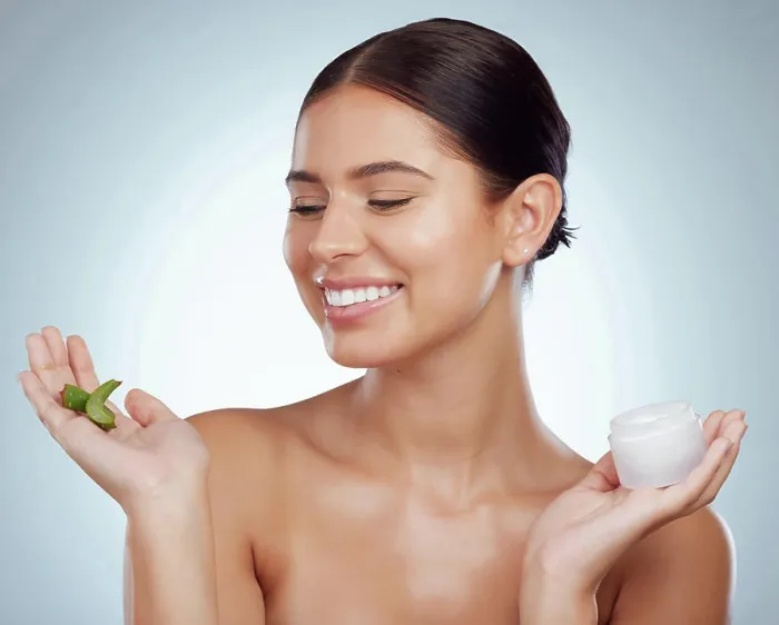 Framed Print : Face cream, aloe vera or woman with smile for beauty on white background with herbs Framed Print : Face cream, aloe vera or woman with smile for beauty on white background with herbs