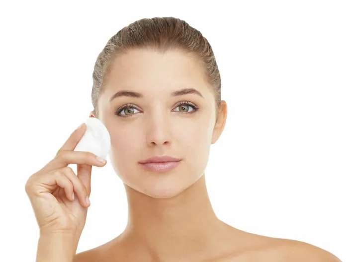 Framed Print : Face, skincare or cotton pad for woman in studio for wellness Framed Print : Face, skincare or cotton pad for woman in studio for wellness