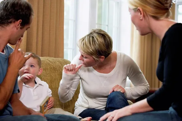 Framed Print : Family conversing in sign language