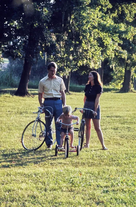 Framed Print : Family enjoying a sunny day with a bike ride in the park Framed Print : Family enjoying a sunny day with a bike ride in the park