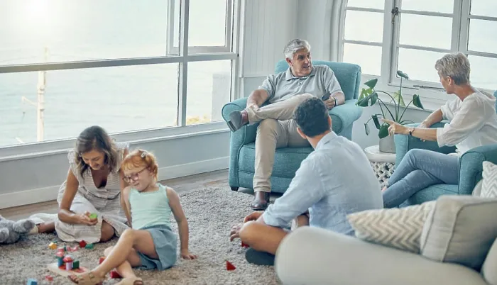 Framed Print : Family, generations and love together in living room with parents