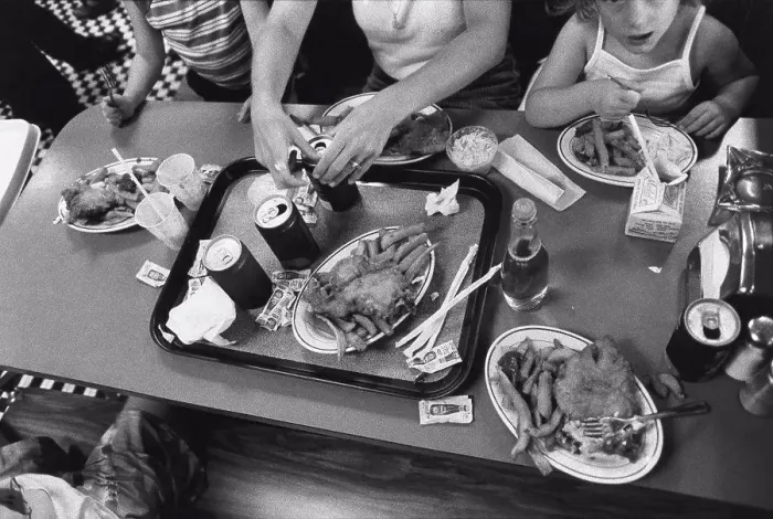 Framed Print : Family having junk food meal Framed Print : Family having junk food meal
