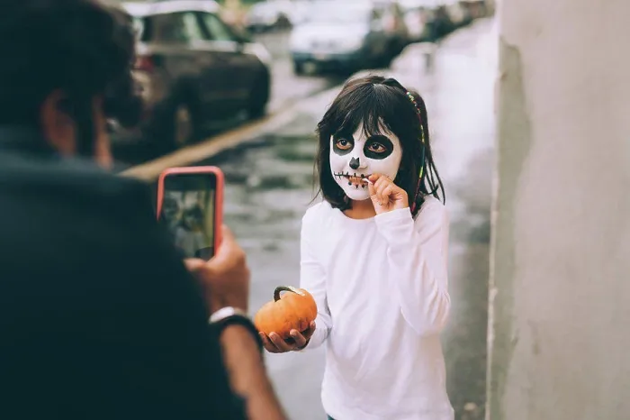 Framed Print : Father photographing daughter at Halloween Framed Print : Father photographing daughter at Halloween
