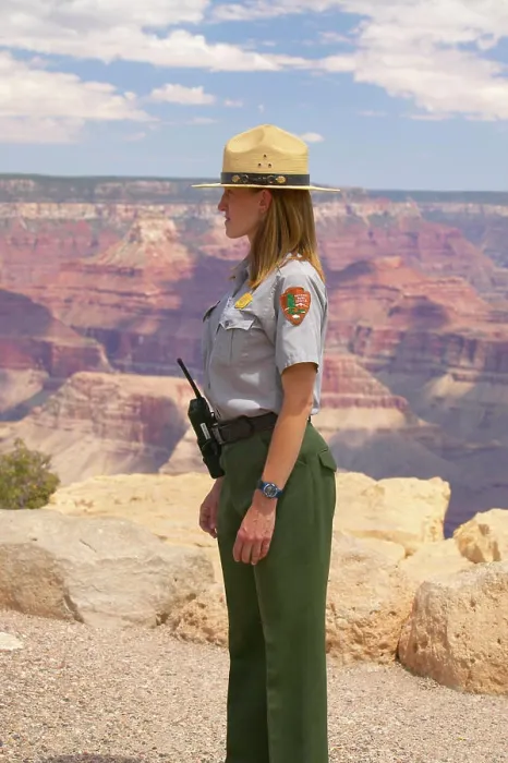 Framed Print : Female National Park ranger looking at South Rim of Grand Canyon National Park in mid-summer in Arizona Framed Print : Female National Park ranger looking at South Rim of Grand Canyon National Park in mid-summer in Arizona