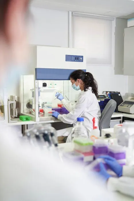 Framed Print : Female scientist in face mask working in laboratory Framed Print : Female scientist in face mask working in laboratory