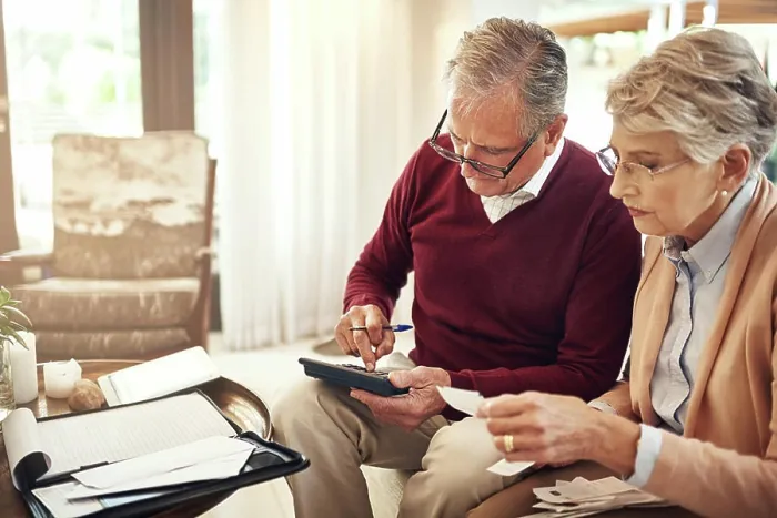 Framed Print : Finance, calculator and budget with an old couple in their home for retirement or pension planning Framed Print : Finance, calculator and budget with an old couple in their home for retirement or pension planning
