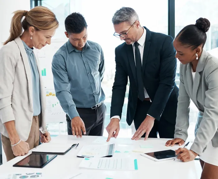 Framed Print : Finance, data and business people working on a graph in a modern office Framed Print : Finance, data and business people working on a graph in a modern office
