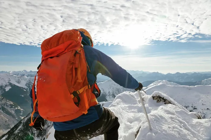 Framed Print : First person view of a backpacker approaching mountain summit Framed Print : First person view of a backpacker approaching mountain summit